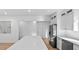 Modern kitchen showcasing a large island, stainless steel appliances, and stylish white cabinets at 1557 Alder Se Ct, Atlanta, GA 30317