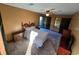 Bedroom with a ceiling fan, bedside tables, and neutral walls at 3412 Sherrod Sw Dr, Marietta, GA 30060