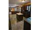 Well-equipped kitchen with dark wood cabinets and central island at 3412 Sherrod Sw Dr, Marietta, GA 30060