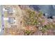 Aerial view of the home showcasing the yard and proximity to the lake at 18 Village Trce, Rydal, GA 30171