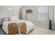 This bedroom offers a cozy ambiance, featuring a stylish bed, and a minimalist decor at 18 Village Trce, Rydal, GA 30171