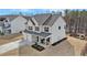 Traditional two-story home with a two-car garage and covered front porch at 18 Village Trce, Rydal, GA 30171