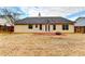 A fenced backyard with a patio provides a private space for outdoor enjoyment at 2506 Creek Station Dr, Buford, GA 30519