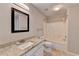 Bathroom features granite countertop vanity, toilet, shower with tub, and neutral walls at 2506 Creek Station Dr, Buford, GA 30519