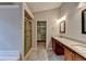 Bright bathroom features double vanity with granite countertops, a shower, and a walk-in closet at 2506 Creek Station Dr, Buford, GA 30519
