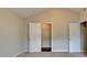 This bright bedroom has neutral carpeting at 2506 Creek Station Dr, Buford, GA 30519