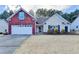 Charming single-Gathering home with a manicured front yard, a two-car garage, and classic architectural design at 2506 Creek Station Dr, Buford, GA 30519