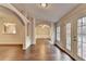 Spacious living room with open archways and hardwood floors at 2506 Creek Station Dr, Buford, GA 30519
