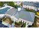 An aerial view of community center featuring a pool and surrounding landscape at 407 Brighton Pt, Atlanta, GA 30328