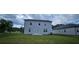 Backyard showcasing the home's backyard and patio at 8588 Secretariat Dr, Lithonia, GA 30058