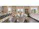 Open dining area with a kitchen bar, plenty of natural light, and room for entertaining at 8588 Secretariat Dr, Lithonia, GA 30058