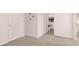 Convenient second-floor laundry room near bedrooms for ease of use; washer and dryer included at 8588 Secretariat Dr, Lithonia, GA 30058