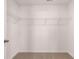 Spacious walk-in closet with wire shelving for organized storage at 8588 Secretariat Dr, Lithonia, GA 30058