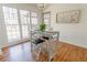 Bright kitchen nook with hardwood floors, large windows, and a casual dining setup at 1030 Laurel Valley Sw Dr, Marietta, GA 30064