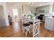 Open kitchen area with modern appliances, gray cabinets, and a table with seating for casual dining at 1030 Laurel Valley Sw Dr, Marietta, GA 30064