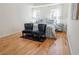 Bright main bedroom features a tray ceiling, hardwood floors, and large windows at 1030 Laurel Valley Sw Dr, Marietta, GA 30064