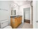 Bathroom featuring granite countertop, wood vanity, tile flooring, and a shower/tub at 250 Pharr Road Northeast Ne Rd, Atlanta, GA 30305