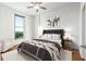 Well-lit bedroom with a modern design, large bed, and bright window at 250 Pharr Road Northeast Ne Rd # 1813, Atlanta, GA 30305