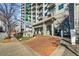 Beautiful building entrance with brick pavers and attractive sign at 250 Pharr Road Northeast Ne Rd, Atlanta, GA 30305