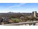 Stunning city view from the balcony, overlooking a green field, trees, and cityscape at 250 Pharr Road Northeast Ne Rd # 1813, Atlanta, GA 30305