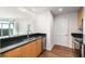 Kitchen area features sleek counter with stainless steel sink and appliances with an open layout at 250 Pharr Road Northeast Ne Rd, Atlanta, GA 30305