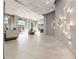 Bright lobby featuring modern lighting, a curved wall, and elegant decor at 250 Pharr Road Northeast Ne Rd # 1813, Atlanta, GA 30305