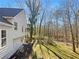 An aerial view of the backyard showing the side of the house and trees at 31 Mariner Se Way, Acworth, GA 30102