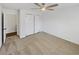 Bedroom with plush carpeting, closet, ceiling fan, and white walls, providing a cozy feel at 31 Mariner Se Way, Acworth, GA 30102