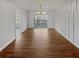 Spacious dining room with wood flooring, modern lighting, and deck access at 31 Mariner Se Way, Acworth, GA 30102