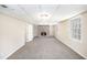 Finished basement with a brick fireplace, built-in bookshelves, and lots of natural light from a window at 3898 Rosedale Ln, Douglasville, GA 30135