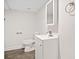 Modern bathroom featuring gray tile floors, white walls and a vanity at 198 Scott St Nw, Atlanta, GA 30314