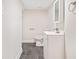 Modern bathroom featuring gray tile floors, white walls and a vanity at 198 Scott St Nw, Atlanta, GA 30314