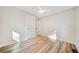 Spacious bedroom with updated hardwood floors and neutral paint at 198 Scott St Nw, Atlanta, GA 30314