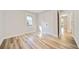 Light-filled bedroom featuring hardwood floors and freshly painted walls at 198 Scott St Nw, Atlanta, GA 30314