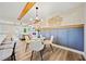 Charming dining area with wainscoting detail, modern light fixture, and bright, neutral decor at 198 Scott St Nw, Atlanta, GA 30314