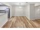 Inviting dining room featuring a modern chandelier, open to the kitchen, and enhanced by contemporary flooring at 2725 Saint Augustine Se Trl, Marietta, GA 30067