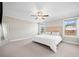 Bedroom with neutral walls, plush carpet and two large windows at 442 Payne Rd, Woodstock, GA 30188