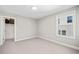 Bright bedroom featuring a closet, and natural light from a window at 442 Payne Rd, Woodstock, GA 30188