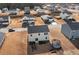 Aerial view of the backyard with a trampoline, garden boxes and an open area ideal for recreation and relaxation at 608 Tudor St, Euharlee, GA 30145