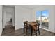 Dining area featuring a modern table, chairs, and a large window with lots of natural light at 608 Tudor St, Euharlee, GA 30145