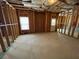 Unfinished basement with roughed in window and door provides customization options at 61 Denton Ct, Acworth, GA 30101