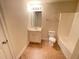 Bathroom featuring standard fixtures and tile floors at 61 Denton Ct, Acworth, GA 30101