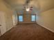 Spacious bedroom with neutral walls, carpet floors, and a ceiling fan at 61 Denton Ct, Acworth, GA 30101