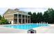 Community pool and clubhouse provide residents space to relax and socialize at 61 Denton Ct, Acworth, GA 30101