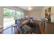 Bright living room featuring large windows, hardwood floors, and stylish contemporary furniture at 4149 Indian Lake Cir, Stone Mountain, GA 30083