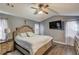 Spacious primary bedroom with vaulted ceiling, ceiling fan, and a serene, neutral color palette at 629 Granite Ln, Loganville, GA 30052