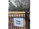 Community dog park with signage to designate the pet play area for residents at 795 Hammond Dr # 1904, Atlanta, GA 30328