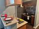 Galley style kitchen featuring wood cabinets and stainless steel appliances at 795 Hammond Dr # 1904, Atlanta, GA 30328