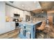 Bright kitchen with stainless steel appliances and an island with bar seating at 890 Memorial Se Dr # 102, Atlanta, GA 30316