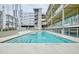 Modern apartment complex community pool with in-pool steps and a great view at 890 Memorial Se Dr # 102, Atlanta, GA 30316